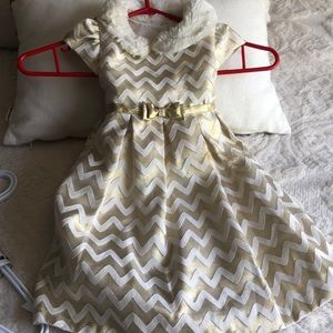 Adorable wintering dress .. tulle and gold with a white fur trimming